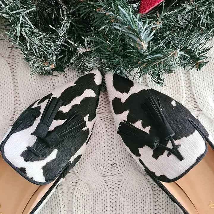 COW PRINT LOAFERS WITH TASSEL